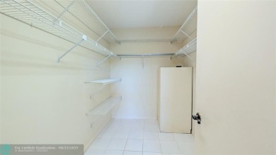 Embrace the vibrant 55+ lifestyle in South Florida's best-kept on Wynmoor Golf Course in Florida - for sale on GolfHomes.com, golf home, golf lot