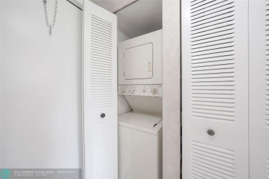 Top-floor 2BD/2BA condo in Sunrise Lakes Phase 4, a 55+ on Sunrise Lakes Phase IV Golf Course in Florida - for sale on GolfHomes.com, golf home, golf lot