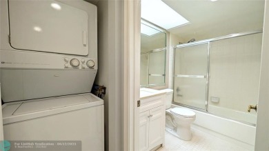 Embrace the vibrant 55+ lifestyle in South Florida's best-kept on Wynmoor Golf Course in Florida - for sale on GolfHomes.com, golf home, golf lot