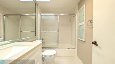 Embrace the vibrant 55+ lifestyle in South Florida's best-kept on Wynmoor Golf Course in Florida - for sale on GolfHomes.com, golf home, golf lot