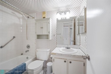 Top-floor 2BD/2BA condo in Sunrise Lakes Phase 4, a 55+ on Sunrise Lakes Phase IV Golf Course in Florida - for sale on GolfHomes.com, golf home, golf lot