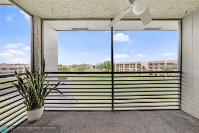 Top-floor 2BD/2BA condo in Sunrise Lakes Phase 4, a 55+ on Sunrise Lakes Phase IV Golf Course in Florida - for sale on GolfHomes.com, golf home, golf lot