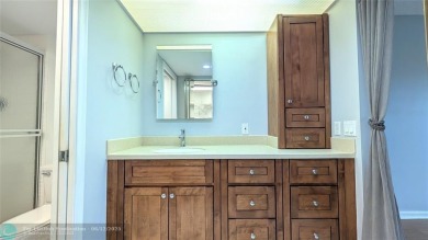 Embrace the vibrant 55+ lifestyle in South Florida's best-kept on Wynmoor Golf Course in Florida - for sale on GolfHomes.com, golf home, golf lot