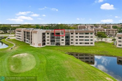 Top-floor 2BD/2BA condo in Sunrise Lakes Phase 4, a 55+ on Sunrise Lakes Phase IV Golf Course in Florida - for sale on GolfHomes.com, golf home, golf lot