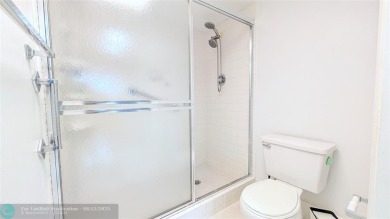 Embrace the vibrant 55+ lifestyle in South Florida's best-kept on Wynmoor Golf Course in Florida - for sale on GolfHomes.com, golf home, golf lot