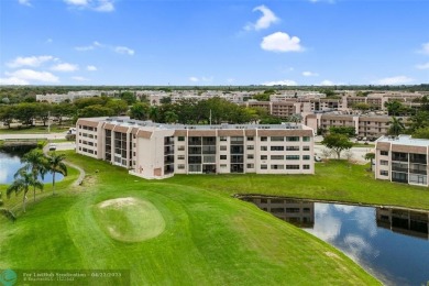 Top-floor 2BD/2BA condo in Sunrise Lakes Phase 4, a 55+ on Sunrise Lakes Phase IV Golf Course in Florida - for sale on GolfHomes.com, golf home, golf lot