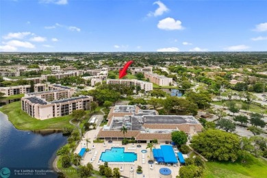 Top-floor 2BD/2BA condo in Sunrise Lakes Phase 4, a 55+ on Sunrise Lakes Phase IV Golf Course in Florida - for sale on GolfHomes.com, golf home, golf lot