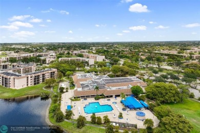 Top-floor 2BD/2BA condo in Sunrise Lakes Phase 4, a 55+ on Sunrise Lakes Phase IV Golf Course in Florida - for sale on GolfHomes.com, golf home, golf lot