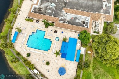 Top-floor 2BD/2BA condo in Sunrise Lakes Phase 4, a 55+ on Sunrise Lakes Phase IV Golf Course in Florida - for sale on GolfHomes.com, golf home, golf lot