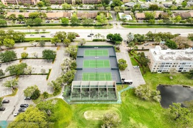 Top-floor 2BD/2BA condo in Sunrise Lakes Phase 4, a 55+ on Sunrise Lakes Phase IV Golf Course in Florida - for sale on GolfHomes.com, golf home, golf lot