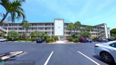 Embrace the vibrant 55+ lifestyle in South Florida's best-kept on Wynmoor Golf Course in Florida - for sale on GolfHomes.com, golf home, golf lot