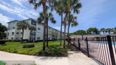 Embrace the vibrant 55+ lifestyle in South Florida's best-kept on Wynmoor Golf Course in Florida - for sale on GolfHomes.com, golf home, golf lot