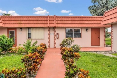 Sought after corner 1/1.5 villa on canal. Your new home features on Kings Point Golf -Flanders Way in Florida - for sale on GolfHomes.com, golf home, golf lot