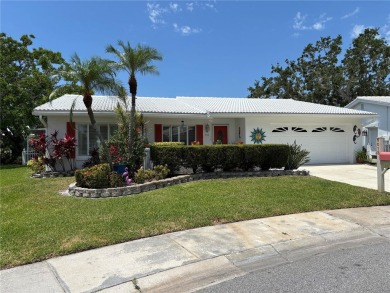 Welcome Home!  This spacious, beautifully updated Philodendron on Mainlands Golf Club in Florida - for sale on GolfHomes.com, golf home, golf lot