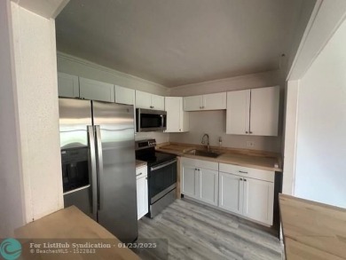 Sought after corner 1/1.5 villa on canal. Your new home features on Kings Point Golf -Flanders Way in Florida - for sale on GolfHomes.com, golf home, golf lot