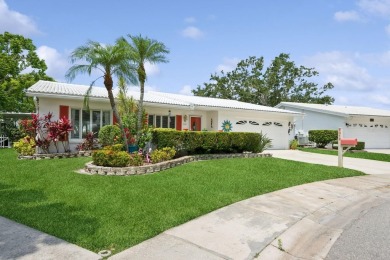 Welcome Home!  This spacious, beautifully updated Philodendron on Mainlands Golf Club in Florida - for sale on GolfHomes.com, golf home, golf lot