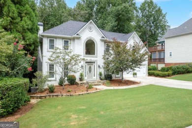 Welcome to your dream home in the highly coveted, resort-style on Towne Lake Hills Golf Club in Georgia - for sale on GolfHomes.com, golf home, golf lot