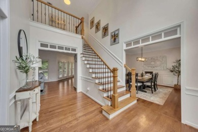 Welcome to your dream home in the highly coveted, resort-style on Towne Lake Hills Golf Club in Georgia - for sale on GolfHomes.com, golf home, golf lot