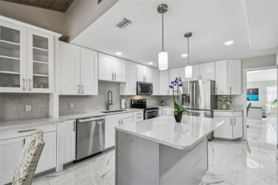 Your DREAM home awaits in the heart of beautiful CARROLLWOOD on Carrollwood Country Club in Florida - for sale on GolfHomes.com, golf home, golf lot