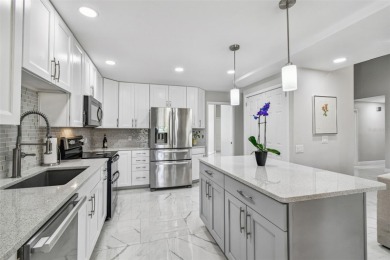 Your DREAM home awaits in the heart of beautiful CARROLLWOOD on Carrollwood Country Club in Florida - for sale on GolfHomes.com, golf home, golf lot