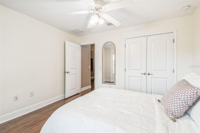 Beautifully maintained and decorated with style, this on Meadow Oaks Golf and Country Club in Florida - for sale on GolfHomes.com, golf home, golf lot