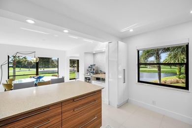 Welcome to this beautifully updated second-floor residence in on Quail Ridge Golf Course and Country Club in Florida - for sale on GolfHomes.com, golf home, golf lot