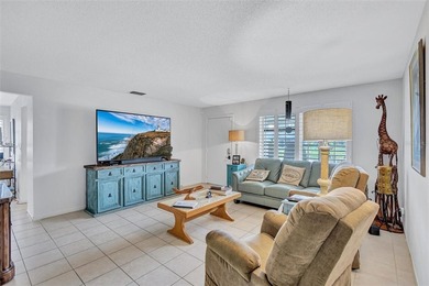 Welcome to this charming single-family home tucked away on a on Highland Lakes Executive Golf Course in Florida - for sale on GolfHomes.com, golf home, golf lot