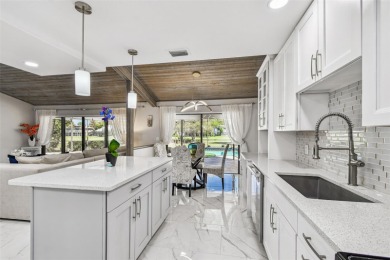 Your DREAM home awaits in the heart of beautiful CARROLLWOOD on Carrollwood Country Club in Florida - for sale on GolfHomes.com, golf home, golf lot