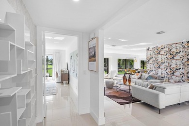 Welcome to this beautifully updated second-floor residence in on Quail Ridge Golf Course and Country Club in Florida - for sale on GolfHomes.com, golf home, golf lot