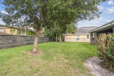 Beautifully maintained and decorated with style, this on Meadow Oaks Golf and Country Club in Florida - for sale on GolfHomes.com, golf home, golf lot