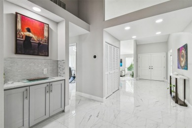 Your DREAM home awaits in the heart of beautiful CARROLLWOOD on Carrollwood Country Club in Florida - for sale on GolfHomes.com, golf home, golf lot