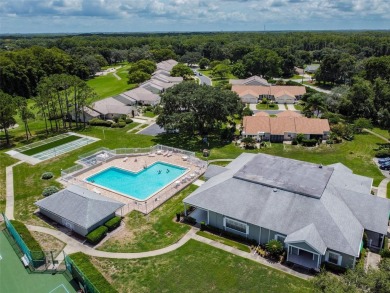 Beautifully maintained and decorated with style, this on Meadow Oaks Golf and Country Club in Florida - for sale on GolfHomes.com, golf home, golf lot