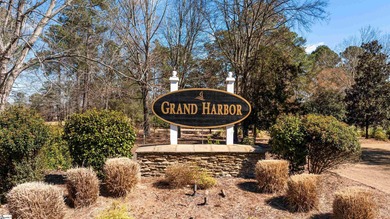 Experience Upscale Lake Living on Lake Greenwood in the on The Patriot Golf Club At Grand Harbor in South Carolina - for sale on GolfHomes.com, golf home, golf lot
