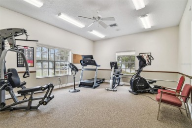 Beautifully maintained and decorated with style, this on Meadow Oaks Golf and Country Club in Florida - for sale on GolfHomes.com, golf home, golf lot