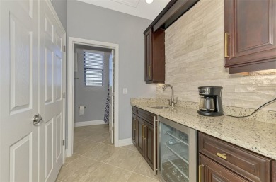 Now is your opportunity to own this rarely available stunningly on Sarasota National Golf Club in Florida - for sale on GolfHomes.com, golf home, golf lot