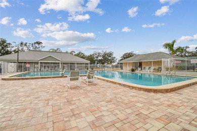 Beautifully maintained and decorated with style, this on Meadow Oaks Golf and Country Club in Florida - for sale on GolfHomes.com, golf home, golf lot