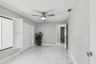 Your DREAM home awaits in the heart of beautiful CARROLLWOOD on Carrollwood Country Club in Florida - for sale on GolfHomes.com, golf home, golf lot