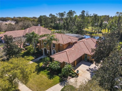 Step into the epitome of luxury living in this Charles Clayton on Alaqua Country Club in Florida - for sale on GolfHomes.com, golf home, golf lot