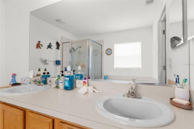 Welcome home to this BEAUTIFULLY MAINTAINED three-bedroom on Spring Hill Golf Course in Florida - for sale on GolfHomes.com, golf home, golf lot