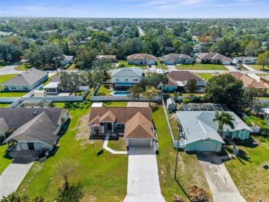 Welcome home to this BEAUTIFULLY MAINTAINED three-bedroom on Spring Hill Golf Course in Florida - for sale on GolfHomes.com, golf home, golf lot