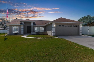 Welcome home to this BEAUTIFULLY MAINTAINED three-bedroom on Spring Hill Golf Course in Florida - for sale on GolfHomes.com, golf home, golf lot