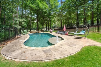 Welcome to a rare blend of luxury, comfort, and natural on Towne Lake Hills Golf Club in Georgia - for sale on GolfHomes.com, golf home, golf lot