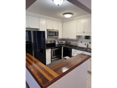Corner first floor unit 1 Bedroom 1/ 1.5 Bathrooms. Fully on Addison Reserve in Florida - for sale on GolfHomes.com, golf home, golf lot