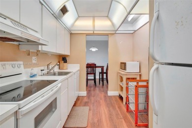 BEAUTIFUL 2/2 CONDO   - ENCLOSED AND SCREENED BALCONY WITH VIEW on Inverrary Country Club in Florida - for sale on GolfHomes.com, golf home, golf lot