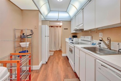 BEAUTIFUL 2/2 CONDO   - ENCLOSED AND SCREENED BALCONY WITH VIEW on Inverrary Country Club in Florida - for sale on GolfHomes.com, golf home, golf lot