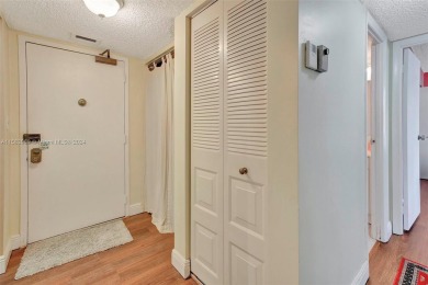 BEAUTIFUL 2/2 CONDO   - ENCLOSED AND SCREENED BALCONY WITH VIEW on Inverrary Country Club in Florida - for sale on GolfHomes.com, golf home, golf lot