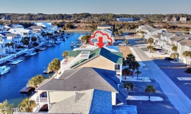 Welcome to your ultimate waterfront paradise! This stunning, 5BR on Sea Trail Golf Resort in North Carolina - for sale on GolfHomes.com, golf home, golf lot