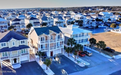 Welcome to your ultimate waterfront paradise! This stunning, 5BR on Sea Trail Golf Resort in North Carolina - for sale on GolfHomes.com, golf home, golf lot