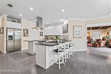 Experience luxury & tranquility in this stunning single-story on Magnolia Point Golf and Country Club in Florida - for sale on GolfHomes.com, golf home, golf lot