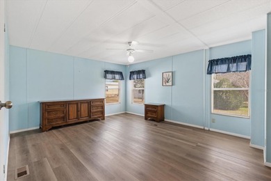 One or more photo(s) has been virtually staged. THE BEAUTIFUL on El Diablo Executive Golf Course in Florida - for sale on GolfHomes.com, golf home, golf lot